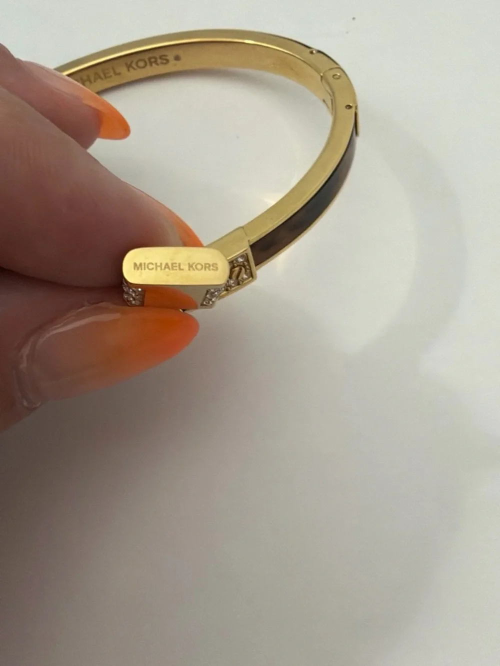 Michael Kors gold tone